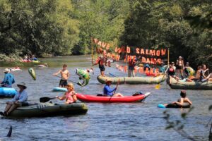 Youth Salmon Protectors take part in the Rally for the River flotilla on the Boise River